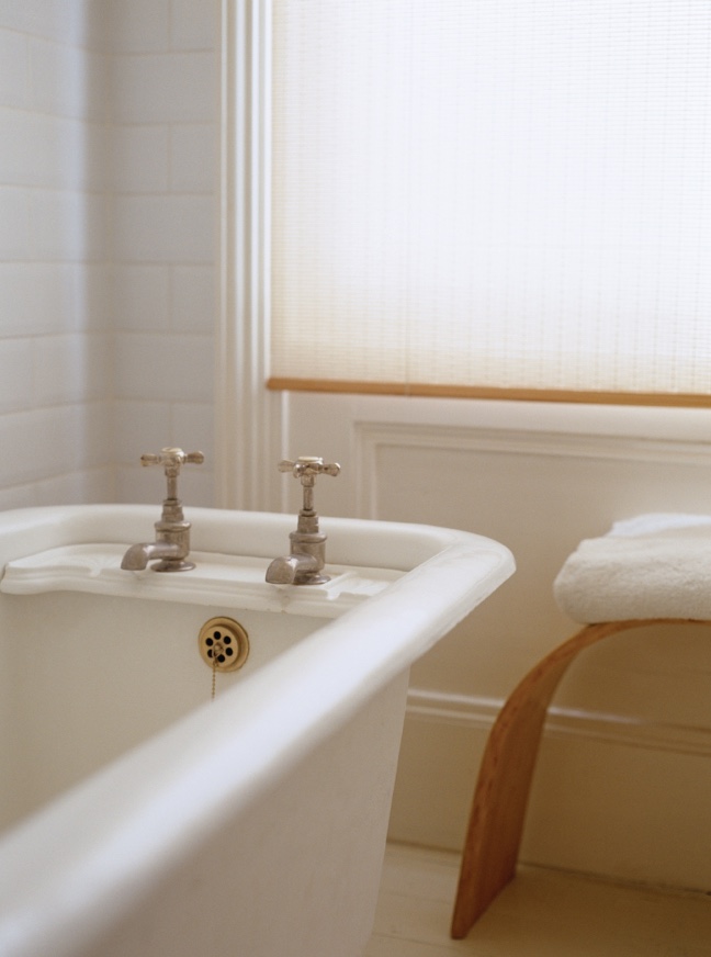 Roller shades in a cozy bathroom